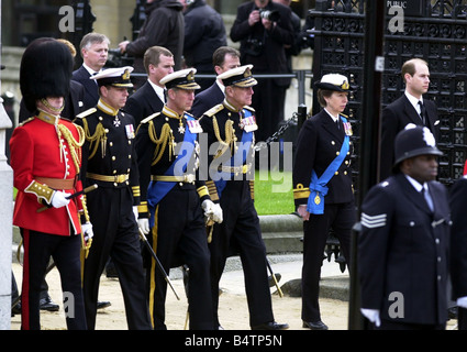 members of the royal family walk behind the coffin of the queen Stock ...