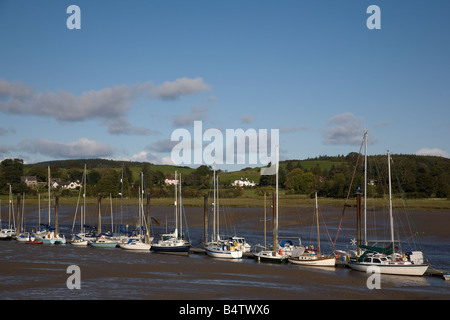 Boats lie in the mud at low tide on the River Dee in Kirkcudbright Scotland Stock Photo