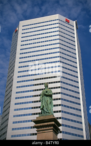 A statue of Queen Victoria surrounded by skyscrapers in Queen Victoria Square in downtown Montreal, Canada. Stock Photo