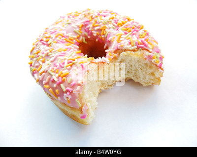 Iced doughnut with bite taken from it Stock Photo