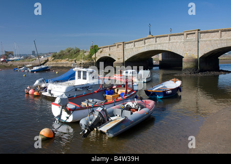 Boats moored in Axmouth Harbour beside Axmouth Bridge, East Devon Stock Photo