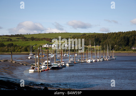 Boats lie in the mud at low tide on the River Dee in Kirkcudbright Scotland Stock Photo