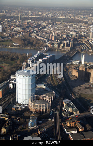 Aerial view north west of Chelsea Bridge Battersea Railway Bridge River Thames gas works Battersea Power Station disused London Stock Photo