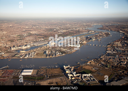 Aerial view north east of The Royal Victoria Dock trading industrial and business estates Silvertown River Thames Flood Barrier Stock Photo