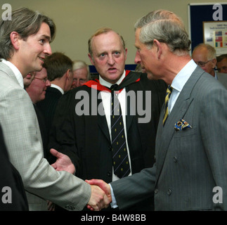 Prince Charles Visits Christ Church In Belfast September 2003 Dr Michael Ridley headmaster RBAI introduces Prince Charles to staff and puplis Stock Photo