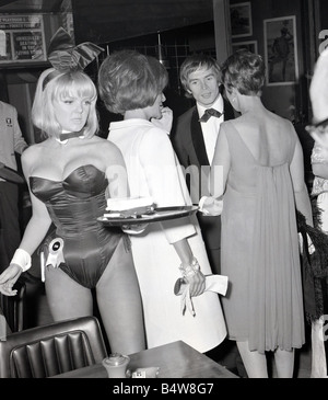 Pictured at the preview party at the london playboy club is Russian Ballet dancer Rudolph Nureyev and Princess Lee Radziwill white coat sister of Jackie Kennedy and of coarse the inevitable Bunny girl serving drinks waitress waitressing Nightclubs London Play Boy Club June 1966 Mirrorpix com Stock Photo