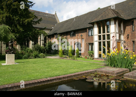 City of Lichfield, England. Almshouses and garden at Saint John’s Chapel and Hospital of St John the Baptist Without the Barrs. Stock Photo