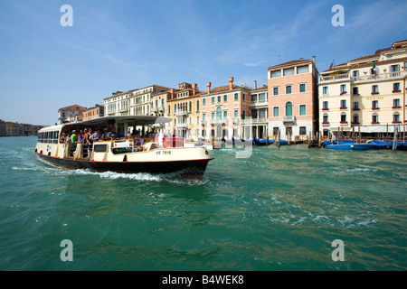 Vaparetto waterbus travelling on the GrandCanal in Venice Italy Stock Photo