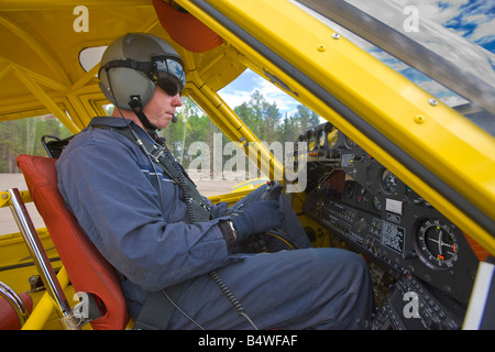 Pilot Guy Cannon in the cockpit of the Air Tractor, AT-802, Ontario, Canada. Model Released. Stock Photo