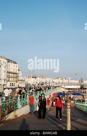 Two young tourists on Brighton seafront East Sussex England Stock Photo