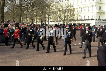 Prince Andrew Prince Charles Prince Philipp Princess Anne Prince Edward Earl of Wessex first row L R Viscount Linley 2nd row 2ndR and Prince William 2nd row R Prince Harry Peter Phillips walk in the funeral procession for Queen Elizabeth the Queen Mother outside Westminster Hall in London April 9 2002 Thousands payed their last respects the last four days to the Queen Mother who died on March 30 After her funeral later today she will be interred at St George s Chapel in Windsor next to her late husband King George VI Mirrorpix Stock Photo