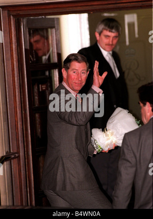 Prince Charles visits the Queen Mother January 1998 Prince Charles wave outside the King Edward VII Hospital in London after visiting the Queen Mother who is recovering from her second hip operation Stock Photo