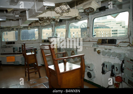 Captain's bridge on HMS Belfast the World War Two battleship moored on the River Thames in central London Stock Photo