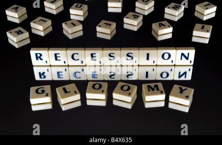 SCRABBLE GAME LETTERS SPELLING RECESSION AND GLOOMY...UK. Stock Photo