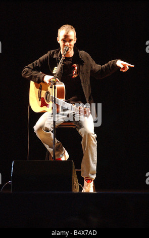 Travis group band March 2002 performing at Holyrood High School in Glasgow singer Fran Healy concert guitar Stock Photo