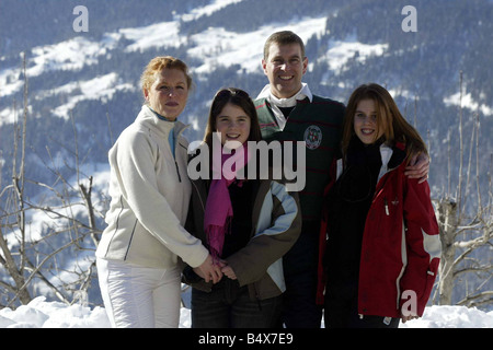 The Duke of York February 2003 Prince Andrew Duchess of York sarah Ferguson with their children Princess Beatrice right and Princess Eugenie at photocall in Verbier switzerland on a skiing holiday with his family Stock Photo