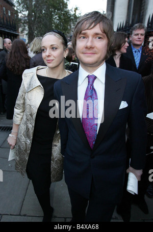 Jasper Carrot s daughter Lucy Davis gets married at St Pauls Cathedral London Guests and Showbiz friends arrived on five red London buses Fellow Office star Martin Freeman and partner at the event 9th December 2006 Stock Photo