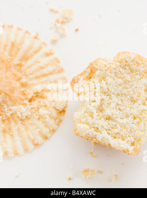 Close up of half eaten muffin and wrapper Stock Photo