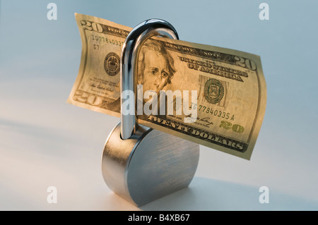 Close up lock and dollar bill Stock Photo