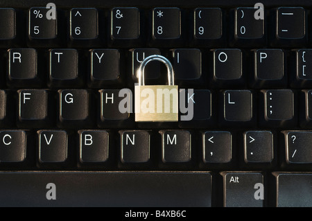 Lock on computer keyboard Stock Photo