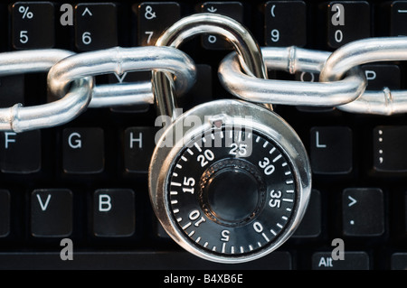 Lock on chain computer keyboard Stock Photo
