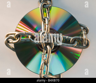 Compact disc locked with metal chain Stock Photo