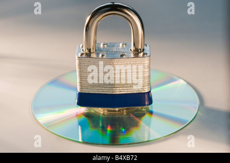 Lock and compact disc Stock Photo