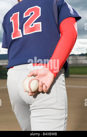 Baseball pitcher getting ready to throw ball Stock Photo