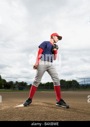 Baseball pitcher getting ready to throw ball Stock Photo