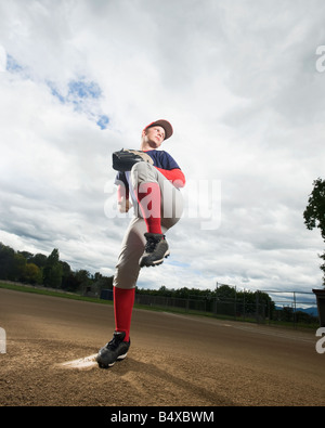 Baseball pitcher getting ready to throw ball Stock Photo