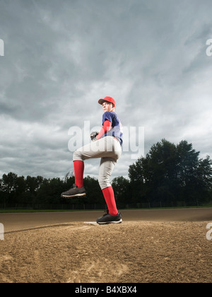 Baseball pitcher getting ready to throw ball Stock Photo