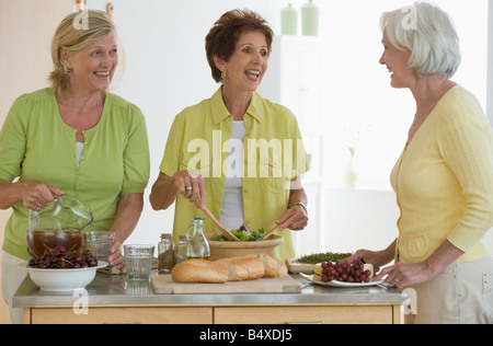 Senior women preparing food Stock Photo