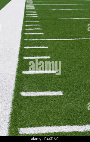 Yard line markers on football field Stock Photo