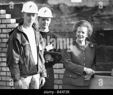 Margaret Thatcher at the foundation stone laying ceremony at St Peter s Basin Newcastle Quayside with building apprentices Alan Stock Photo