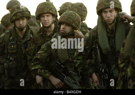 Royal Marine Recruits November 2006 who are taking part in his final excercise with fellow recruits in pembroke wales where they practised a beach assault before the night time excercise Once the marines pass their final test and pass out as a full marine commando they will get their green beret recruits prepare to board the asault aircraft November 2006 Stock Photo