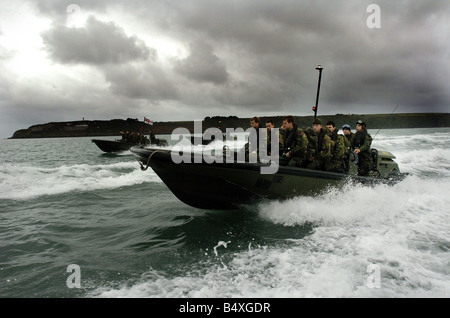 Royal Marine Recruits November 2006 who are taking part in his final excercise with fellow recruits in pembroke wales where they practised a beach assault before the night time excercise Once the marines pass their final test and pass out as a full marine commando they will get their green beret November 2006 Stock Photo