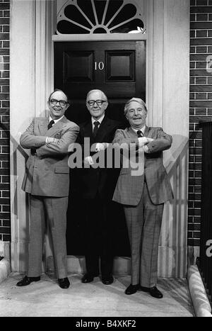 Sir Alec Guinness with Eric Morecambe and Ernie Wise appearing in the Morecambe and Wise Christmas show pose outside Number 10 Downing Street at Teddington Studios Stock Photo