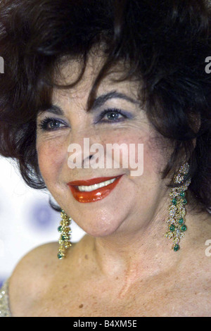 Dame Elizabeth Taylor wearing earings she bought on her arrival at London s Dorchester Hotel Wednesday May 24th 2000 where a charity dinner was held in her honour Stock Photo