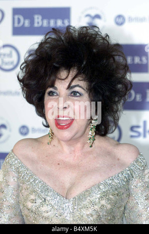 Dame Elizabeth Taylor wearing earings she bought on her arrival at London s Dorchester Hotel Wednesday May 24th 2000 where a charity dinner was held in her honour Stock Photo