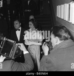 Elizabeth Taylor 1958 Actress with Mike Todd at premiere of ballet Broken Date In 1957 Elizabeth Taylor divorced from her second husband Michael Wilding and announced her engagement to the producer Mike Todd Here they are pictured jetting off to Nice Tragically Todd was killed in a plane crash only a year into their marriage At the age of only 26 Taylor was already twice divorced and now a glamourous widow Elizabeth Taylor in her prime was without doubt one of the world s most beautiful and glamorous women She still is one of the richest most married most famous and sadly most tragic figures Stock Photo