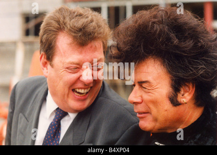 Former bassist of The Animals pop group Chas Chandler left pictured with Gary Glitter Paul Gadd at the topping out ceremony of the Newcastle Arena 12 10 95 Stock Photo