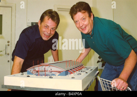 Former bassist of The Animals pop group Chas Chandler right pictured with architect Nigel Stanger talks about the building of the Newcastle Arena 07 08 92 Stock Photo