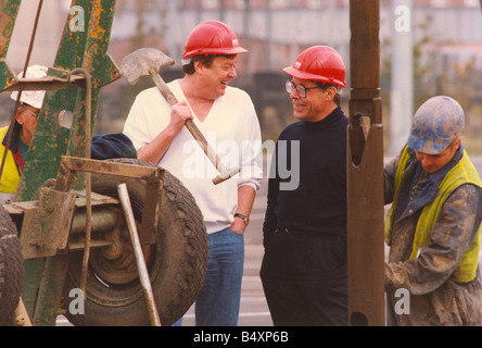 Former bassist of The Animals pop group Chas Chandler left pictured with architect Nigel Stanger during the building of the Newcastle Arena 12 10 94 Stock Photo