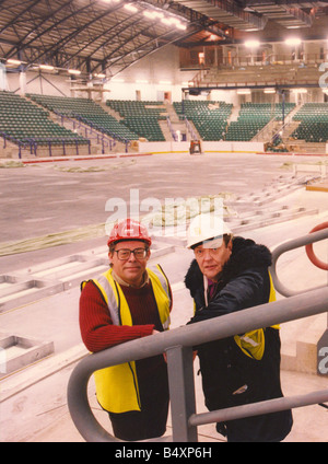 Former bassist of The Animals pop group Chas Chandler right pictured with architect Nigel Stanger during the building of the Newcastle Arena 10 11 95 Stock Photo