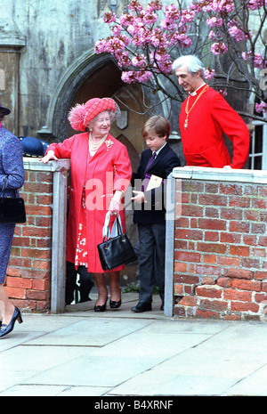 Queen Elizabeth the Queen Mother being helped by her great grandson Prince William as they leave an Easter service at St Georges Chapel Windsor Berkshire April 20 1992 Stock Photo