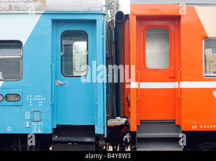 Repainted old passenger train cars. Stock Photo