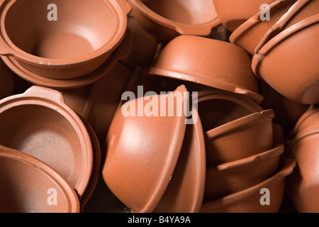 Red clay bowls Nanjing, China. These small clay bowls are used for food. Stock Photo