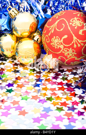 Christmas background with balls, ribbons and confettis Stock Photo