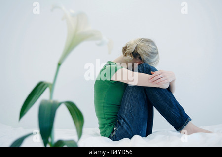 Anorexic young woman inside a special clinic. Stock Photo