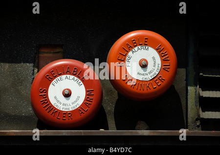 2 red fire alarm bells Stock Photo